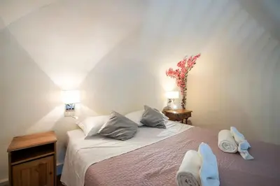 Letto o letti in una camera di 1 - Monolocale silenzioso vicino al centro