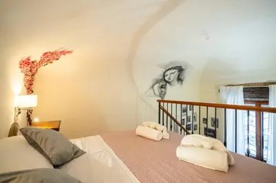 Letto o letti in una camera di 1 - Monolocale silenzioso vicino al centro
