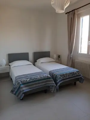 Letto o letti in una camera di Casa Resy