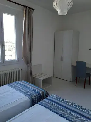 Letto o letti in una camera di Casa Resy