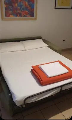 Letto o letti in una camera di Giulia House via dell Ariento 5 Firenze
