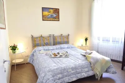 Letto o letti in una camera di Casa Olivia