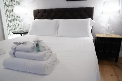 Letto o letti in una camera di Art Apartment Black & White Suite