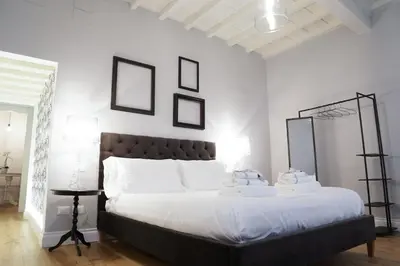 Letto o letti in una camera di Art Apartment Black & White Suite