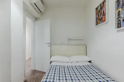 Letto o letti in una camera di GuestHost - Ponte Vecchio & Boboli Modern Apartment