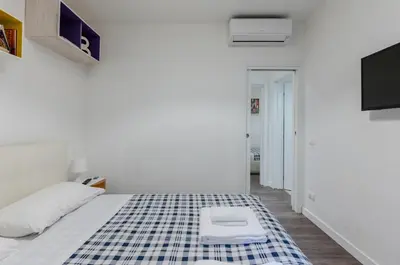 Letto o letti in una camera di GuestHost - Ponte Vecchio & Boboli Modern Apartment