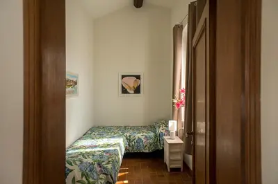Letto o letti in una camera di Il Podestà Bianco