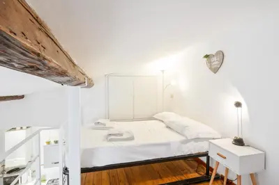 Letto o letti in una camera di GuestHost - Palazzo Medici Apartments