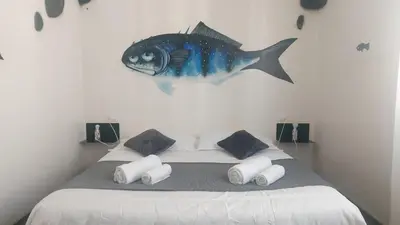 Letto o letti in una camera di Street Art Inn Florence