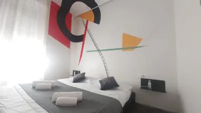 Letto o letti in una camera di Street Art Inn Florence