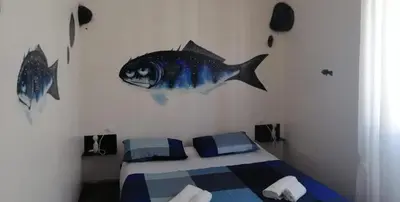 Letto o letti in una camera di Street Art Inn Florence