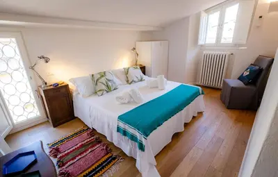 Letto o letti in una camera di Acacia Firenze - Melissa