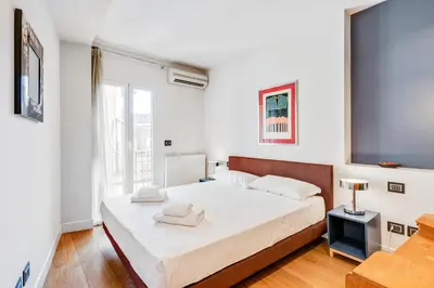 Letto o letti in una camera di GuestHost - Piazza Santa Croce Design Apartment with Balcony