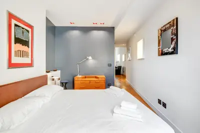 Letto o letti in una camera di GuestHost - Piazza Santa Croce Design Apartment with Balcony