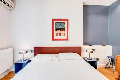 Letto o letti in una camera di GuestHost - Piazza Santa Croce Design Apartment with Balcony