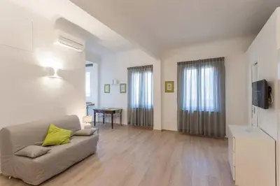 TV o dispositivi per l'intrattenimento presso Santo Spirito Boutique Apartments
