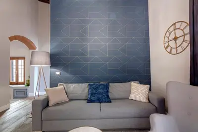 Area soggiorno di Faenza Apartment by Mamo Florence