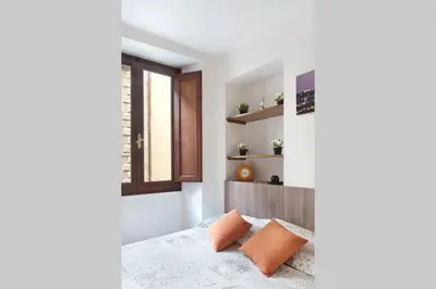 Letto o letti in una camera di Nice portion of property near Santa Croce
