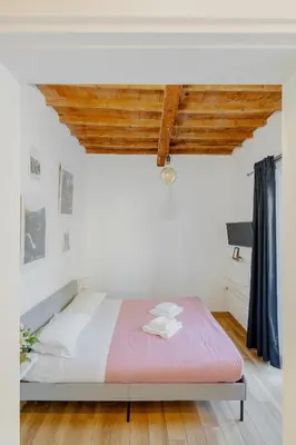 Letto o letti in una camera di Florence David's Guesthouse Steps from Accademia Gallery
