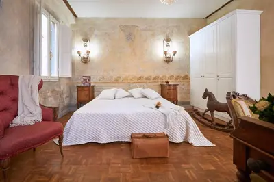Letto o letti in una camera di Firenze Rentals Deluxe Cimatori