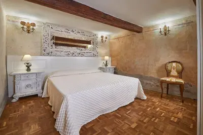 Letto o letti in una camera di Firenze Rentals Deluxe Cimatori