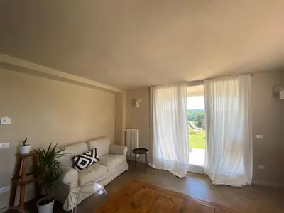 Area soggiorno di casa il colle con piscina privata