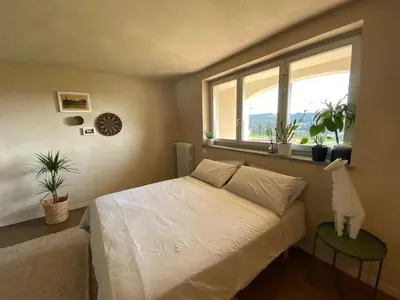 Letto o letti in una camera di casa il colle con piscina privata