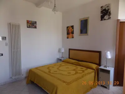Letto o letti in una camera di Il Gatto Con Gli Stivali - Affittacamere