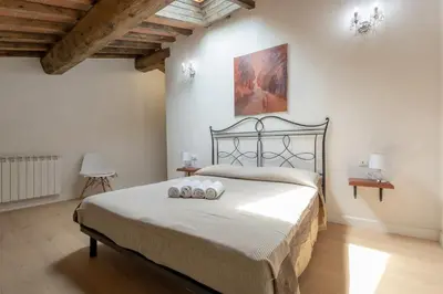 Letto o letti in una camera di Luxury Home Florence vista Cappelle Medicee