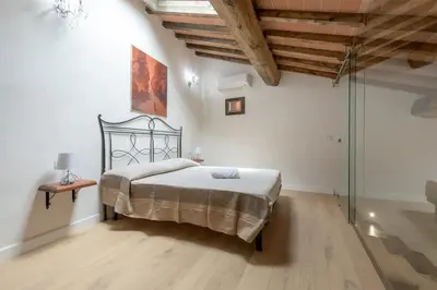 Letto o letti in una camera di Luxury Home Florence vista Cappelle Medicee
