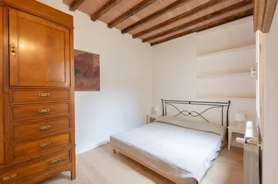 Letto o letti in una camera di Luxury Home Florence terrazza vista Firenze