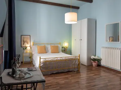 Letto o letti in una camera di Affittacamere Firenze in Libertà Parterre