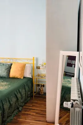 Letto o letti in una camera di Affittacamere Firenze in Libertà Parterre