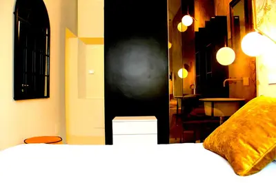Letto o letti in una camera di Colorful Pied-à-Terre _ Via Gioberti
