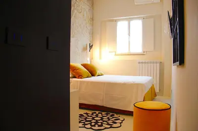 Letto o letti in una camera di Colorful Pied-à-Terre _ Via Gioberti
