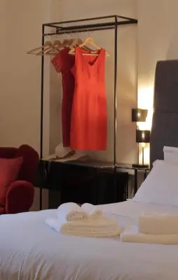 Letto o letti in una camera di Corsini Tintori