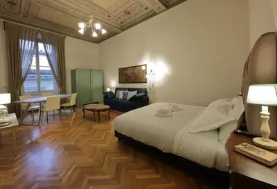 Letto o letti in una camera di Corsini Tintori
