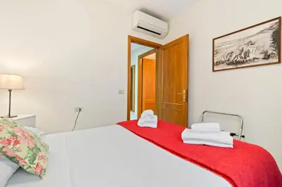Letto o letti in una camera di GuestHost - Borgo Pinti Cozy Flat