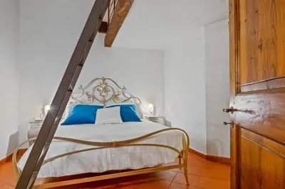 Letto o letti in una camera di GuestHost - Duomo View Anna's Apartment