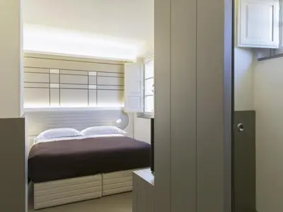 Letto o letti in una camera di Apartment Tipologia Bilo 04 pax by Interhome
