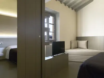 Letto o letti in una camera di Apartment Tipologia Bilo 04 pax by Interhome
