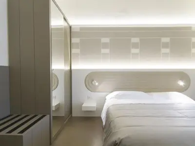 Letto o letti in una camera di Apartment Tipologia Trilo 05 pax by Interhome