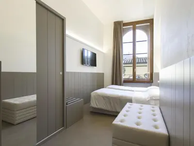 Letto o letti in una camera di Apartment Tipologia Trilo 05 pax by Interhome