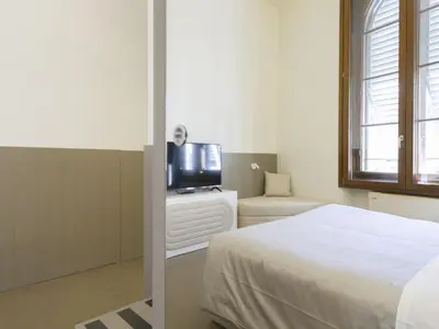 Letto o letti in una camera di Apartment Tipologia Trilo 05 pax by Interhome