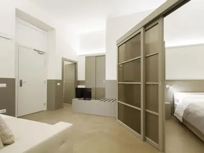 Letto o letti in una camera di Apartment Tipologia Trilo 06 pax by Interhome