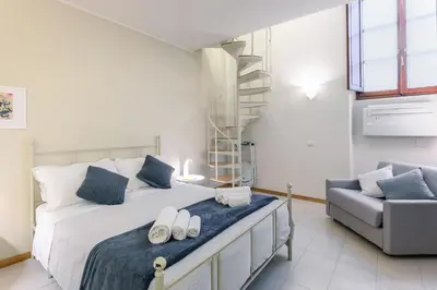 Letto o letti in una camera di Ricasoli Duomo Home