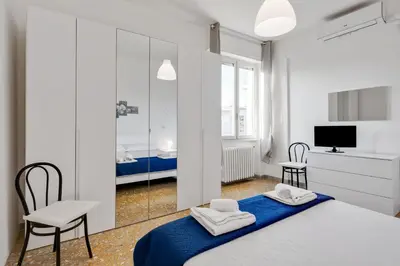 Letto o letti in una camera di GuestHost - Lulli Cozy Apartment with Balcony
