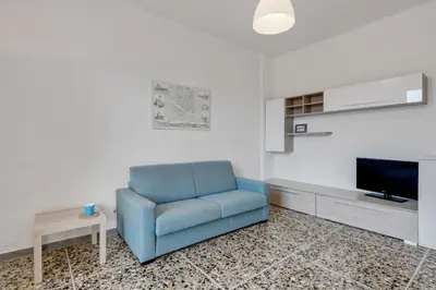 TV o dispositivi per l'intrattenimento presso GuestHost - Lulli Cozy Apartment with Balcony