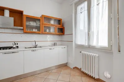 Cucina o angolo cottura di GuestHost - Lulli Cozy Apartment with Balcony