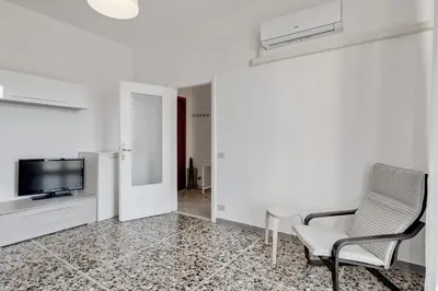 TV o dispositivi per l'intrattenimento presso GuestHost - Lulli Cozy Apartment with Balcony